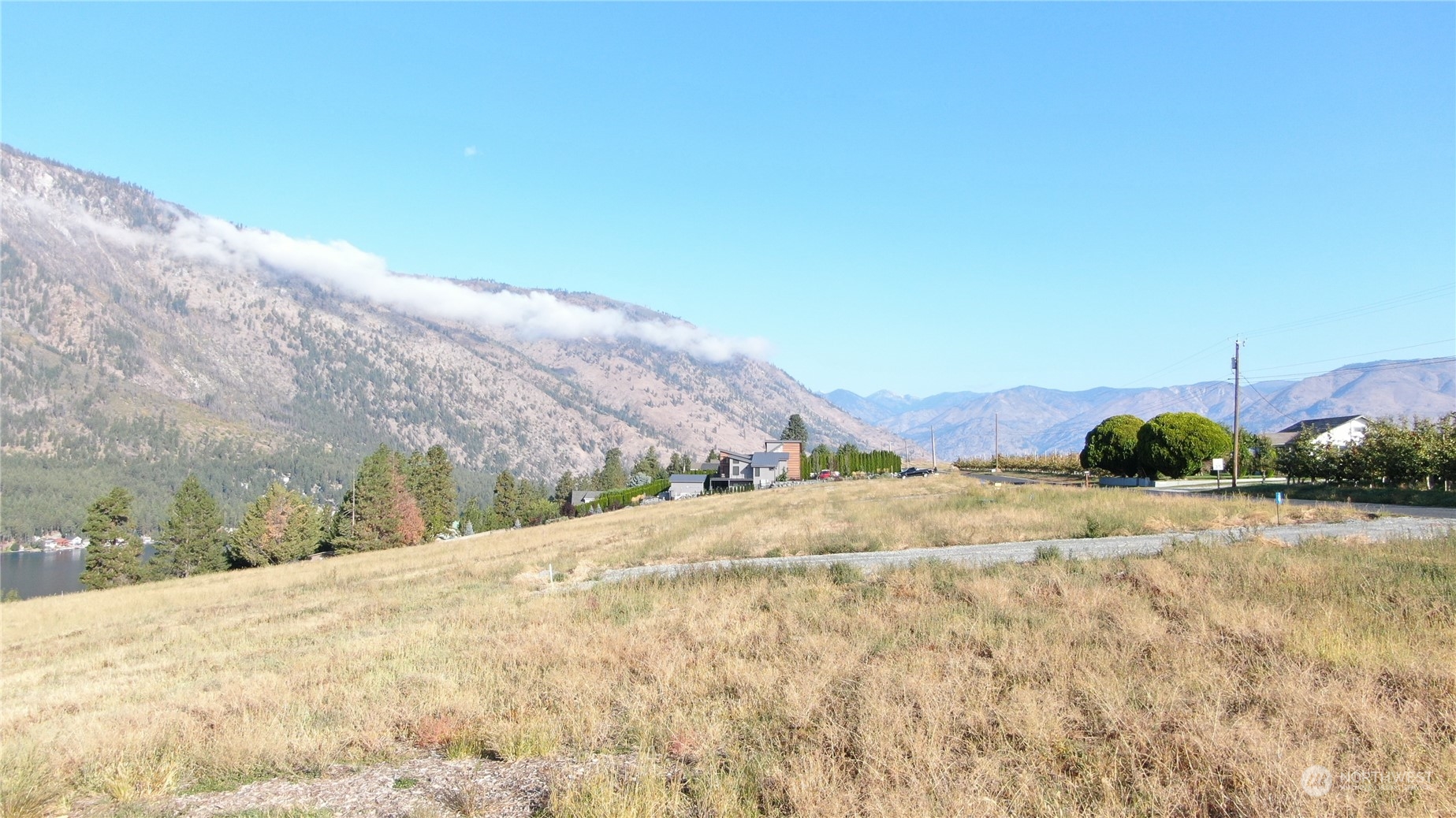 1507 Summit Boulevard Manson, WA 98831 - Photo 5 of 10 a view of a road with a mountain in the background