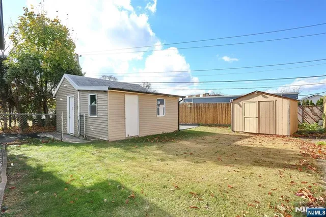 a view of a backyard of a house