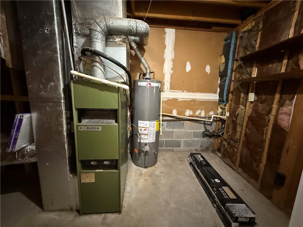 7719 Glen Devon Road Jonesboro, GA 30236 - Photo 29 of 37 a close view of water heater room