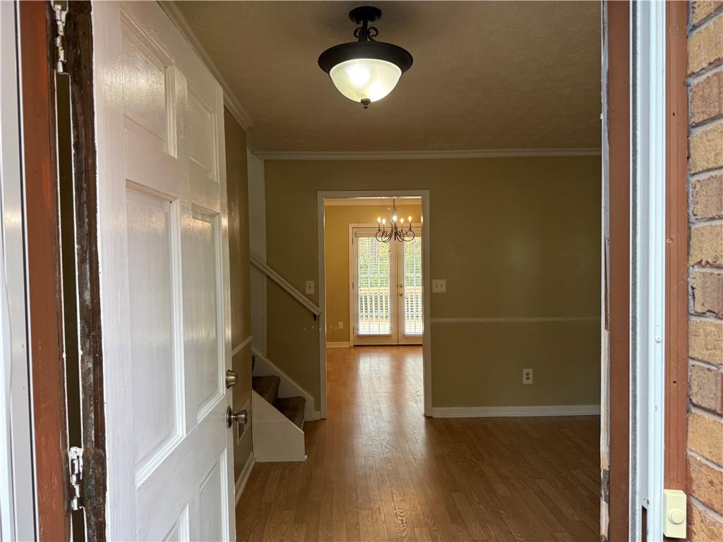 7719 Glen Devon Road Jonesboro, GA 30236 - Photo 5 of 37 a view of a room with wooden floor and a window
