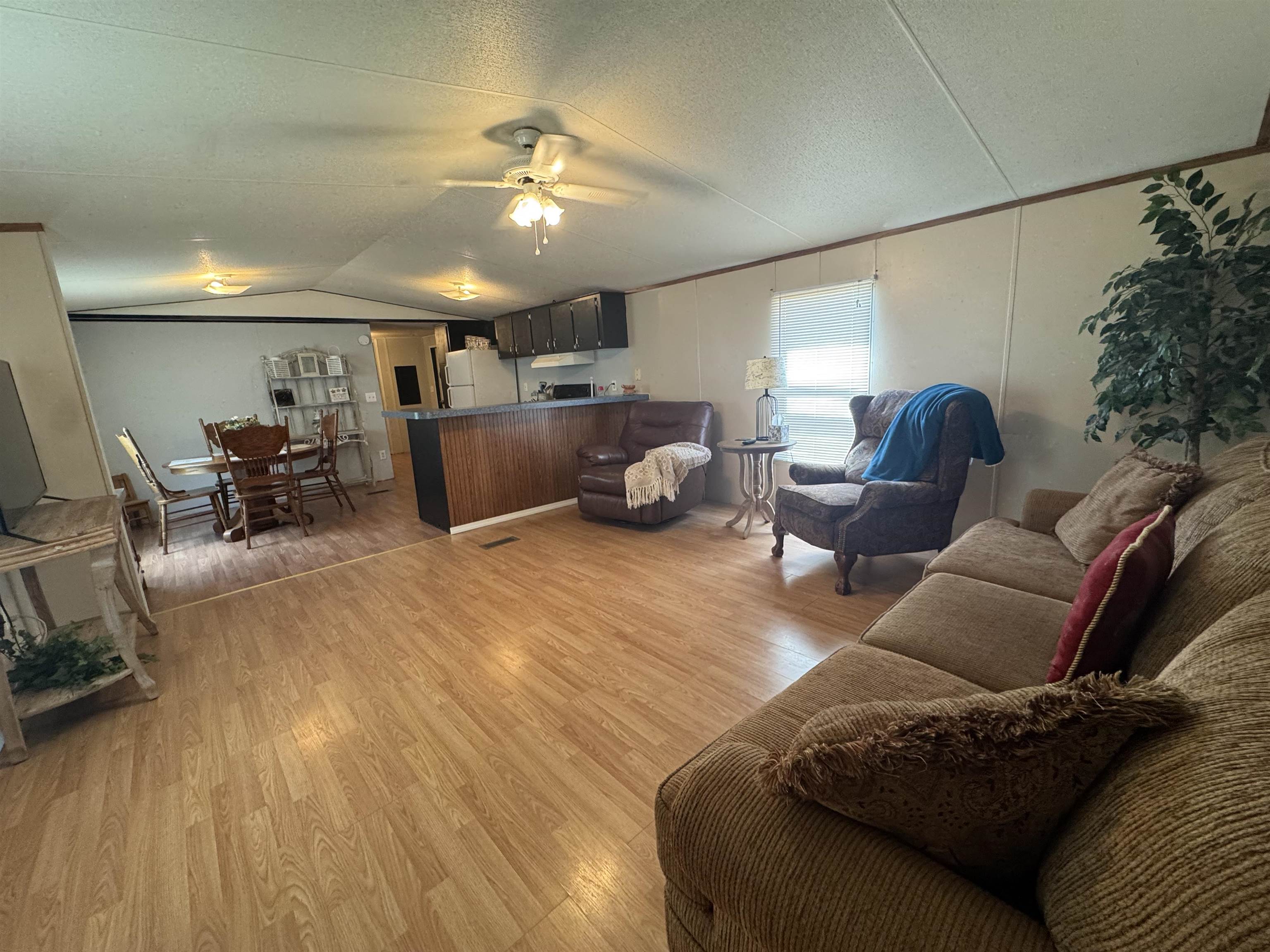 2511 Watkins Road Michie, TN 38357 - Photo 22 of 40 Open-concept living area featuring wood-finish flooring throughout