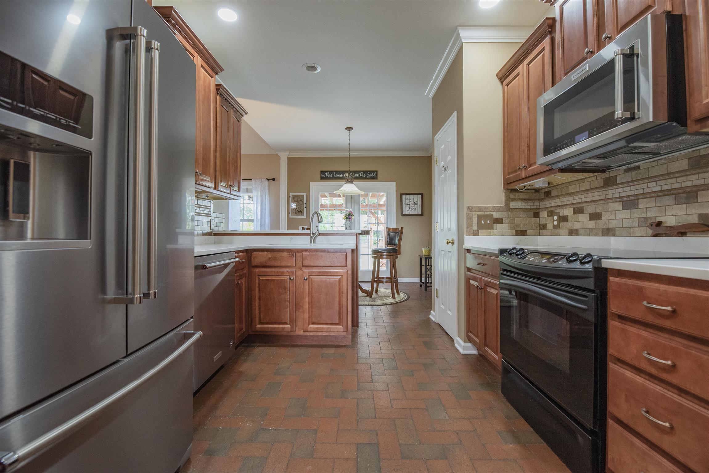10600 Taylor Road Rockvale, TN 37153 - Photo 10 of 30 The kitchen also has new quartz counter tops, built-in microwave and new refrigerator! 10600 Taylor Rd, Rockvale, TN 37153