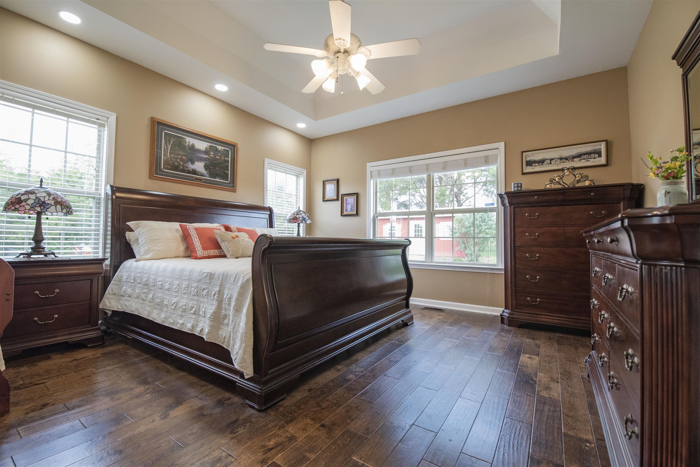 10600 Taylor Road Rockvale, TN 37153 - Photo 12 of 30 The large master suite features hardwood flooring, lots of windows, trey ceiling with ceiling fan and recessed lighting! A must see! 10600 Taylor Rd, Rockvale, TN 37153