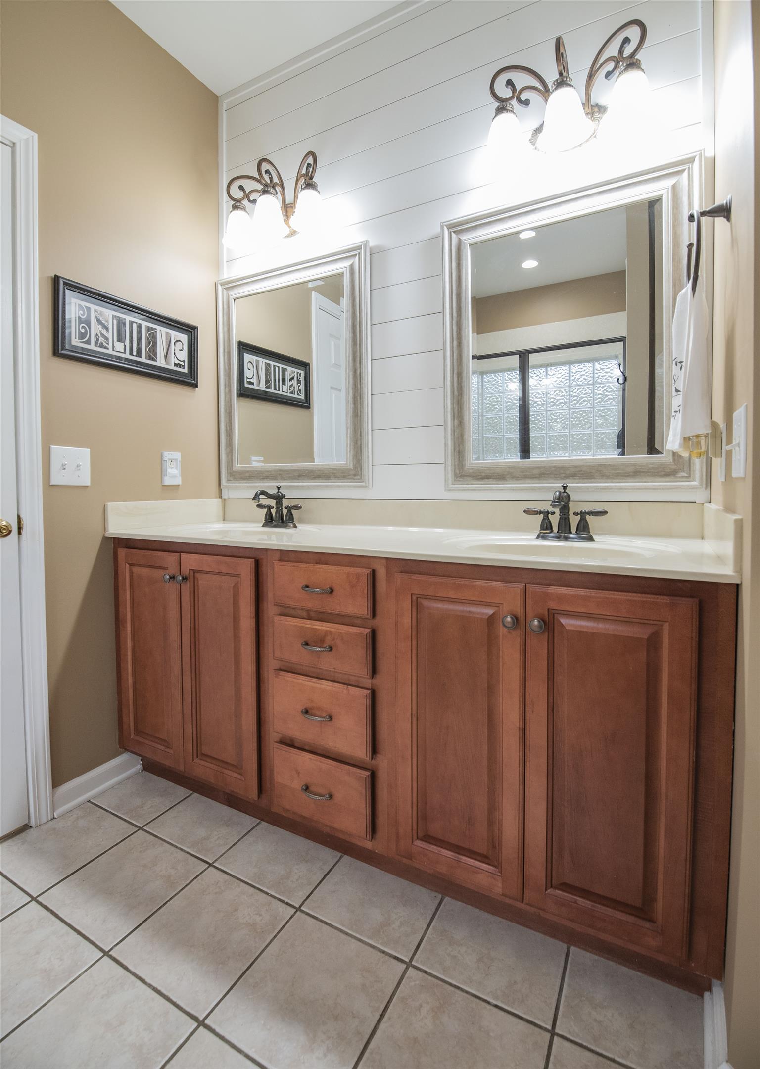 10600 Taylor Road Rockvale, TN 37153 - Photo 13 of 30 The master bathroom has a double vanity and tile flooring! 10600 Taylor Rd, Rockvale, TN 37153