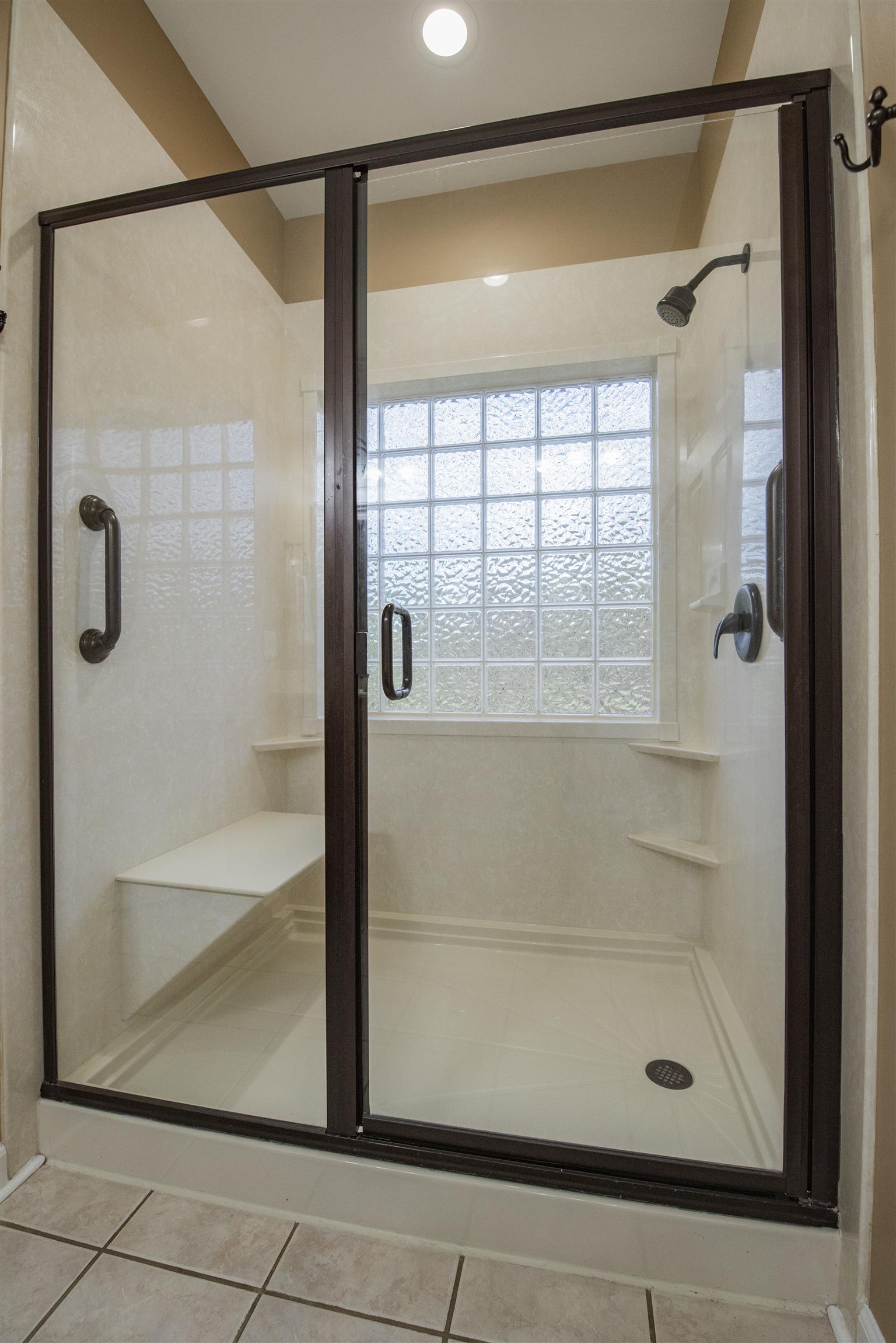 10600 Taylor Road Rockvale, TN 37153 - Photo 14 of 30 The master bathroom also has an extra large walk-in shower with seating! 10600 Taylor Rd, Rockvale, TN 37153