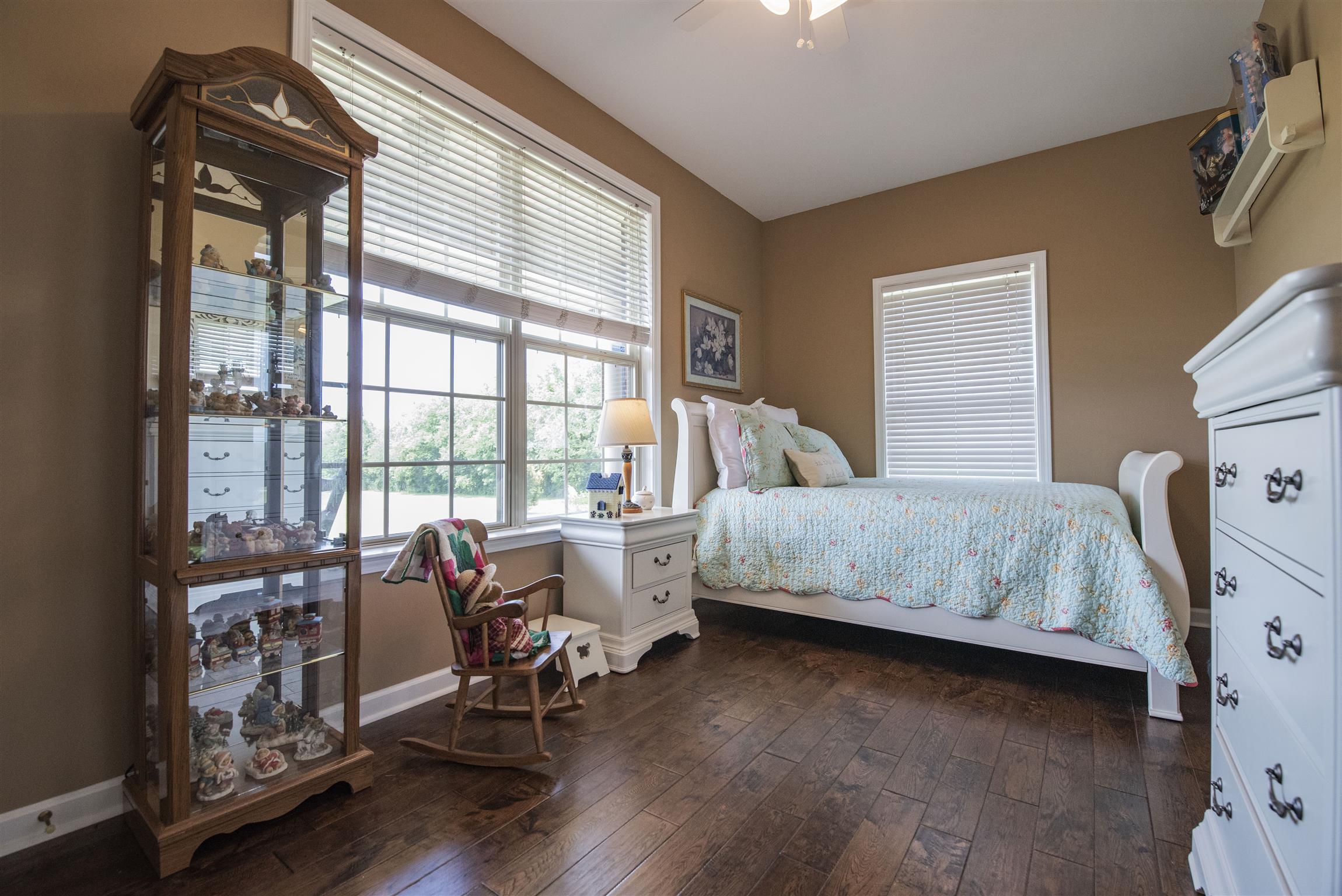 10600 Taylor Road Rockvale, TN 37153 - Photo 15 of 30 The second bedroom has hardwood floors and a large picture window that provides lots of natural light! 10600 Taylor Rd, Rockvale, TN 37153