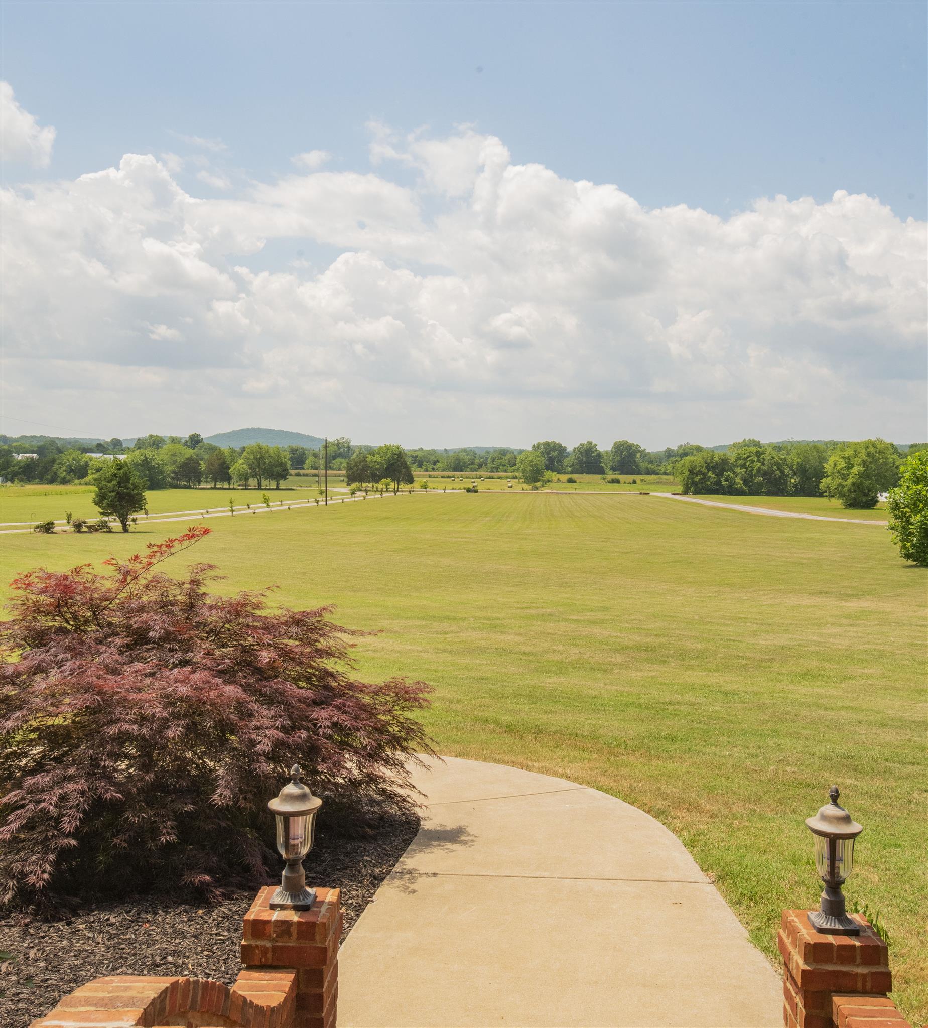 10600 Taylor Road Rockvale, TN 37153 - Photo 4 of 30 Peaceful views from your front porch! Yard is beautifully landscaped with irrigation system! 10600 Taylor Rd, Rockvale, TN 37153