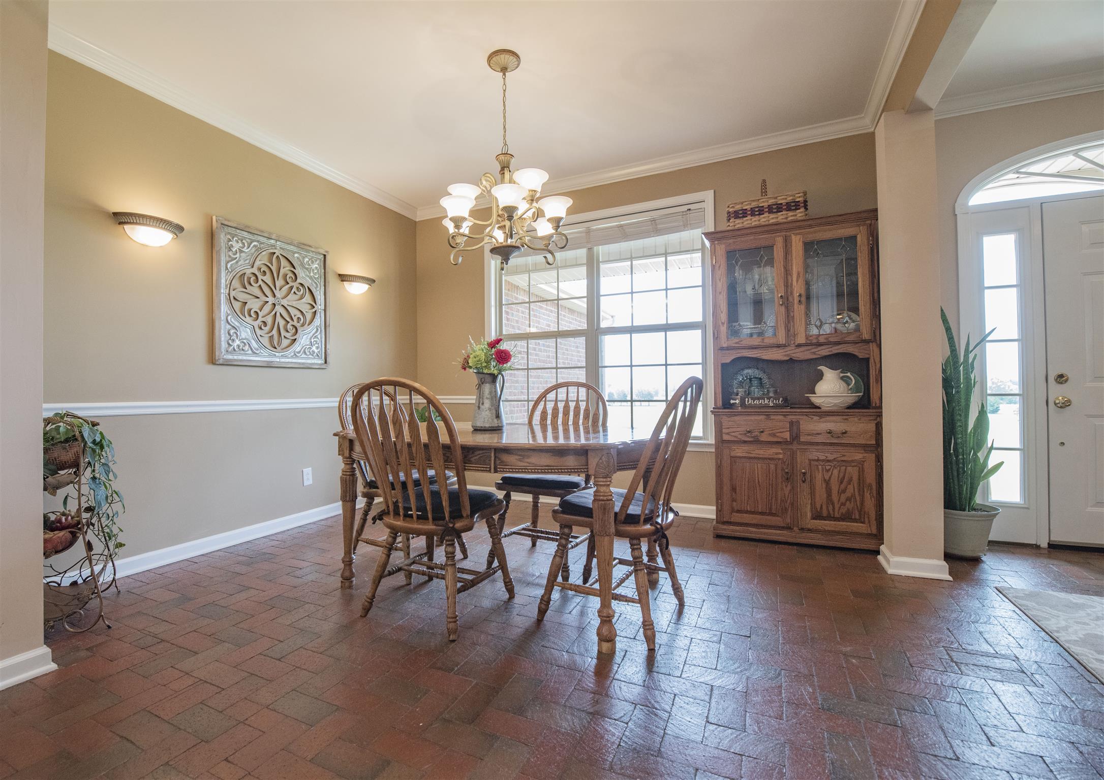 10600 Taylor Road Rockvale, TN 37153 - Photo 5 of 30 To the right of the front entry you will find the open formal dining room with chair railing and beautiful chandelier! 10600 Taylor Rd, Rockvale, TN 37153