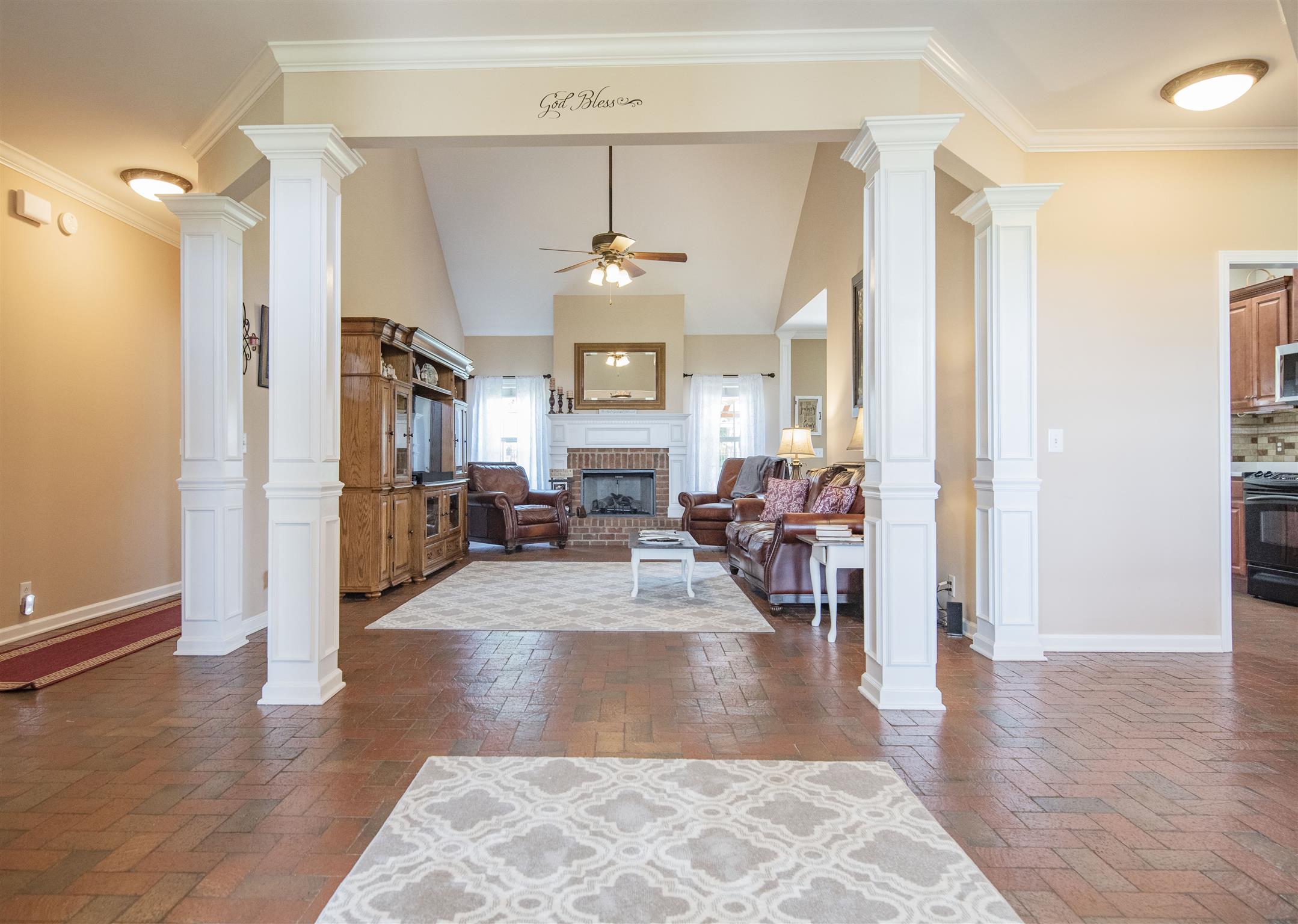 10600 Taylor Road Rockvale, TN 37153 - Photo 29 of 30 This grand entry from the brick floors, columns and open floor plan is absolutely stunning! 10600 Taylor Rd, Rockvale, TN 37153