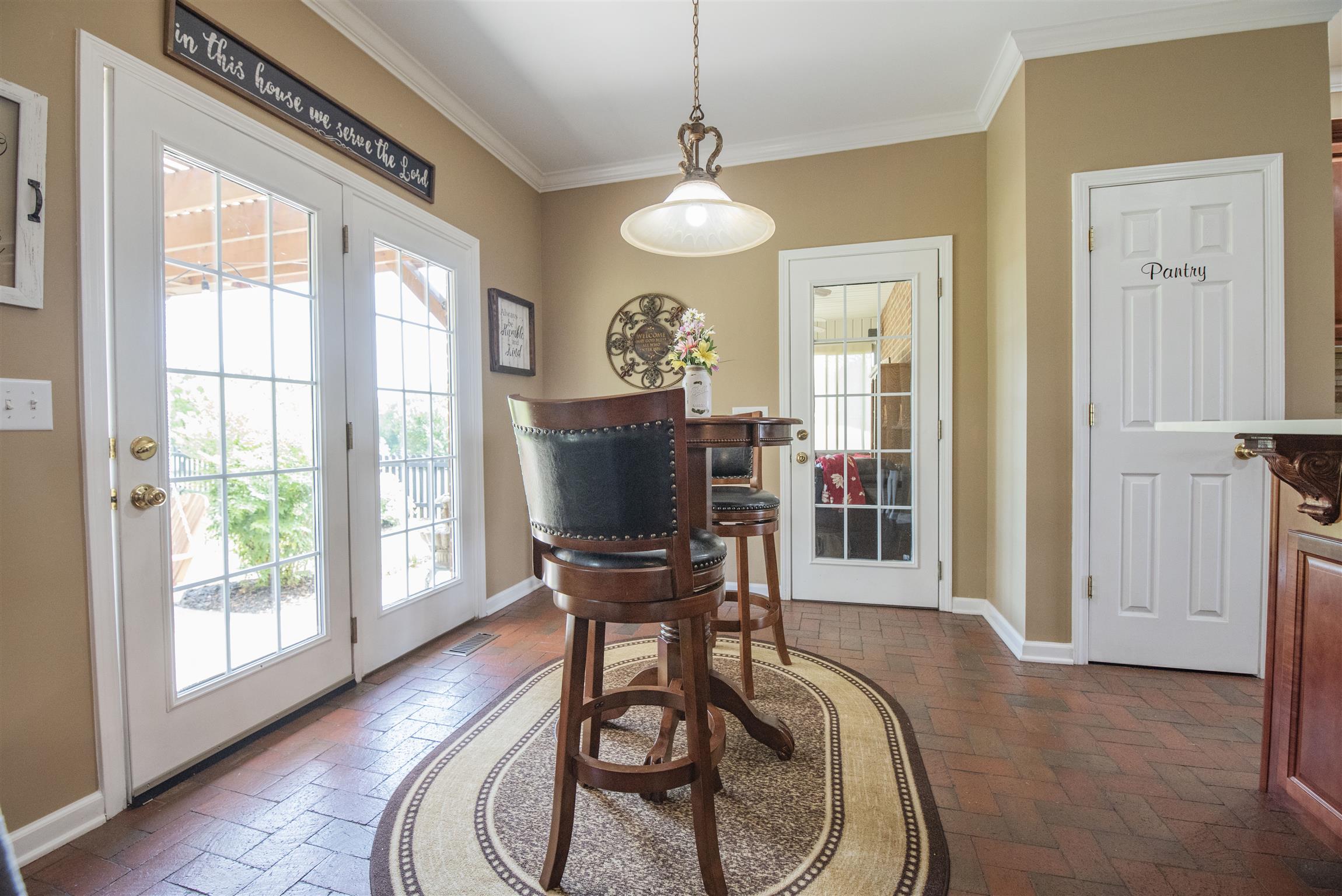 10600 Taylor Road Rockvale, TN 37153 - Photo 7 of 30 You have access to the back patio and sunroom from the breakfast nook! Notice all the extra crown moulding throughout! 10600 Taylor Rd, Rockvale, TN 37153