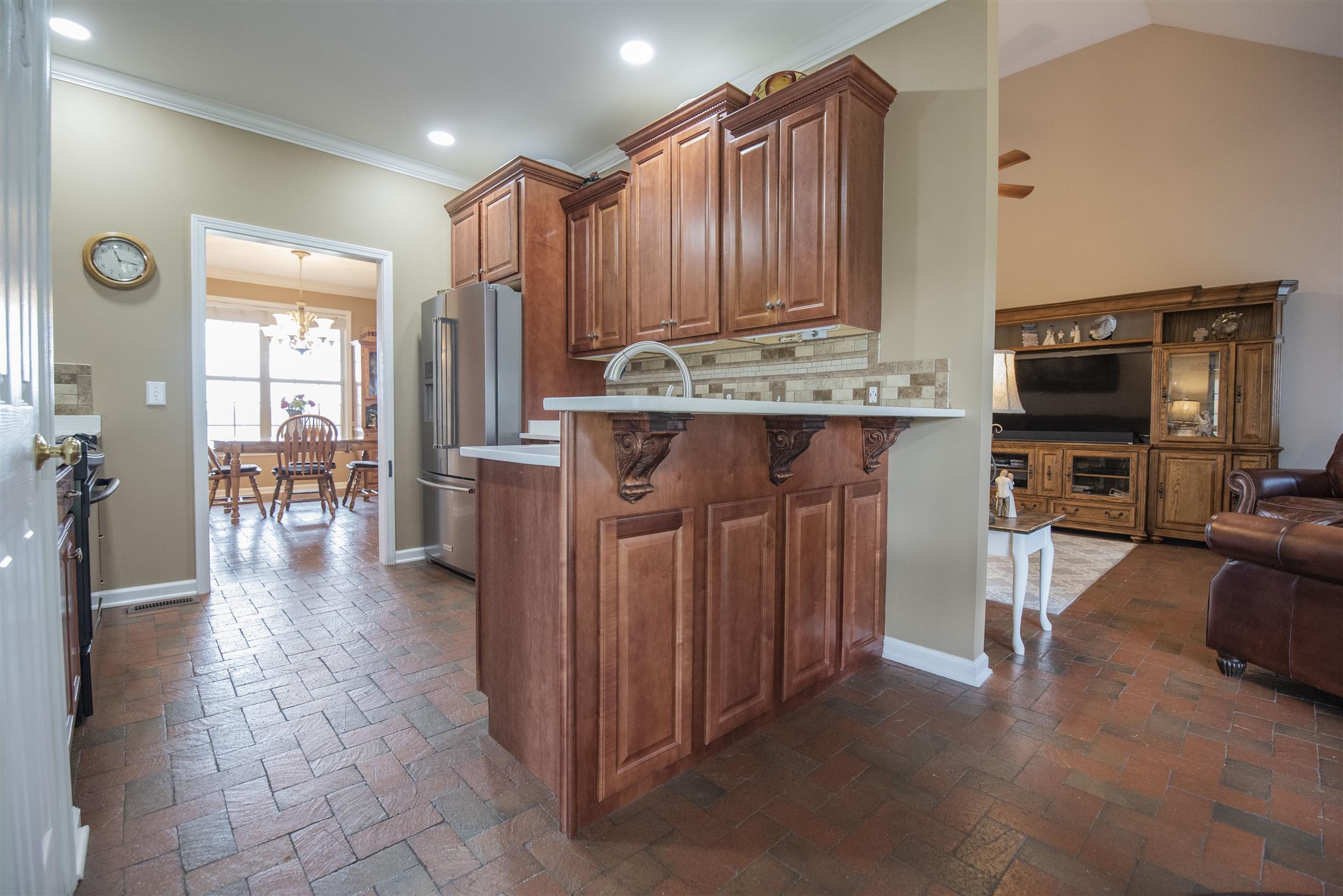 10600 Taylor Road Rockvale, TN 37153 - Photo 8 of 30 The kitchen has cherry cabinets, tile back splash and recessed lighting! 10600 Taylor Rd, Rockvale, TN 37153