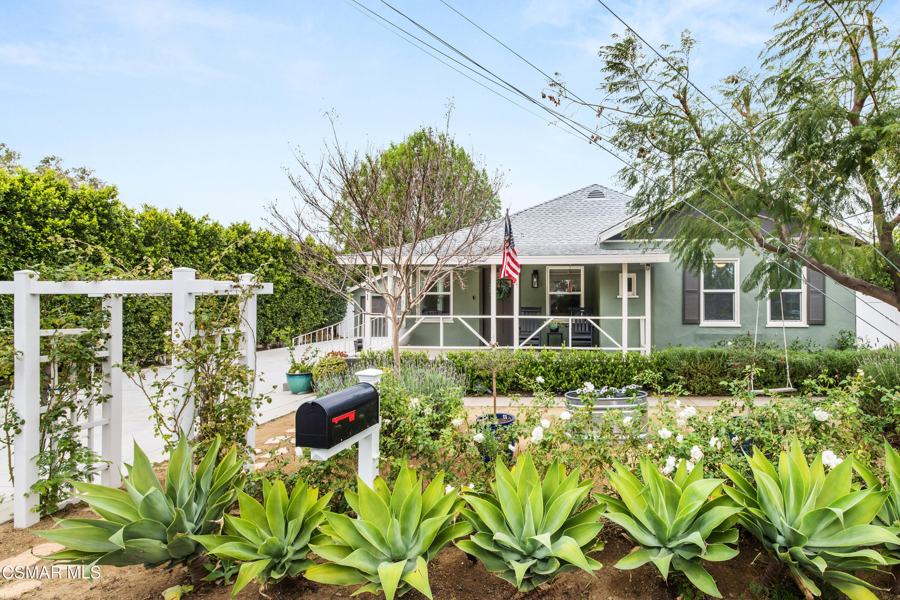 4391 Adam Road Simi Valley, CA 93063 - Photo 2 of 30 a front view of a house with a garden