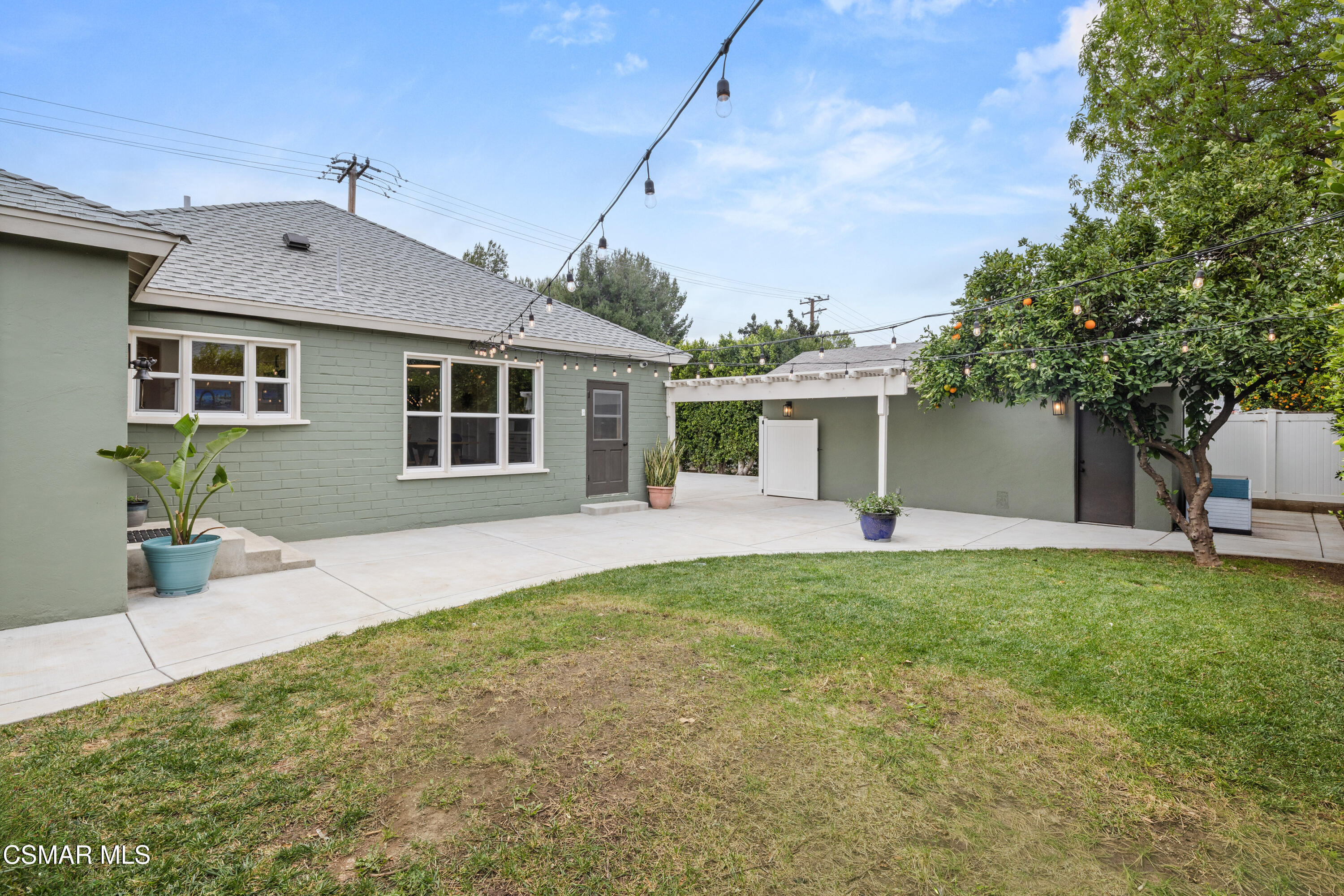 4391 Adam Road Simi Valley, CA 93063 - Photo 30 of 30 a front view of a house with a garden and yard