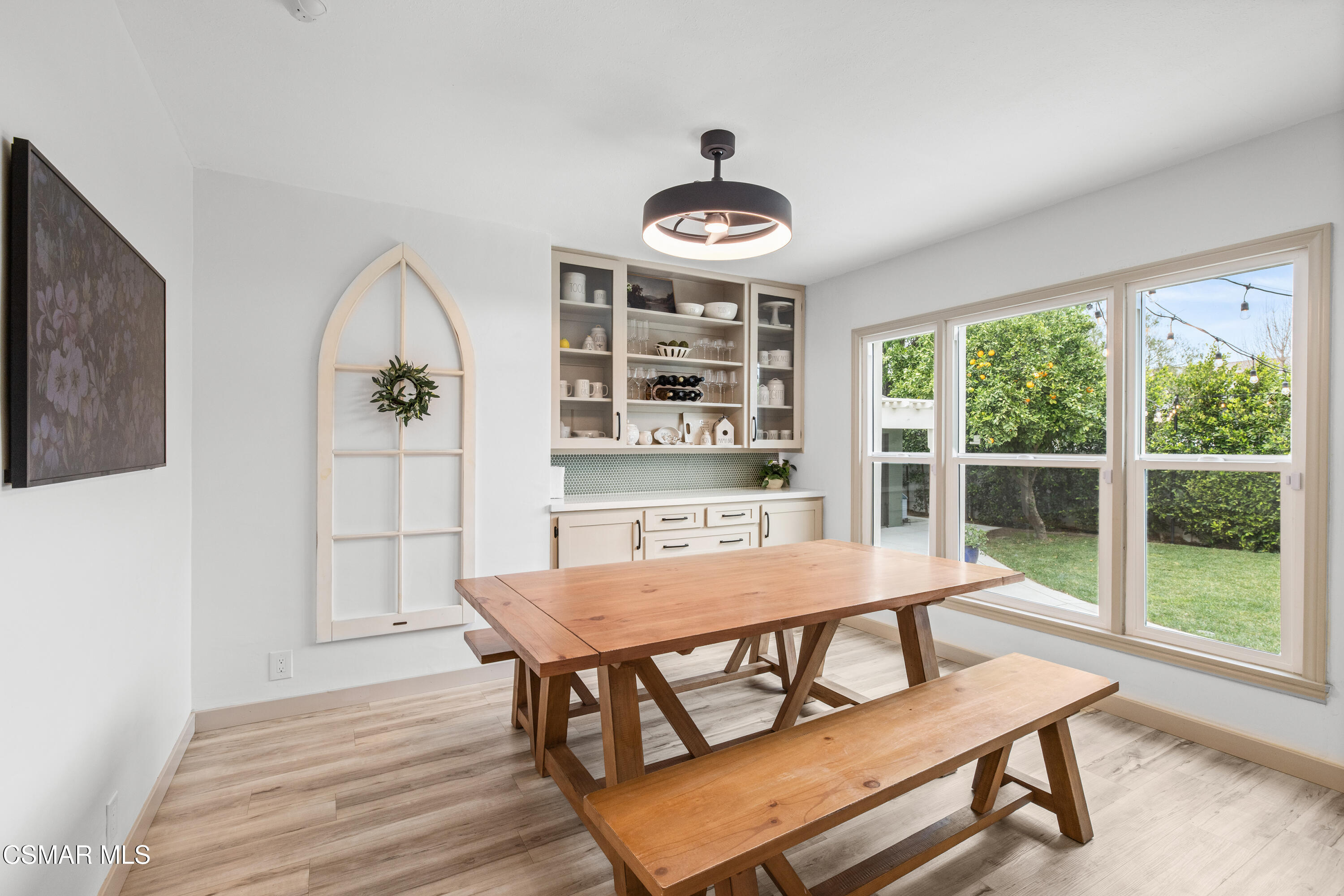 4391 Adam Road Simi Valley, CA 93063 - Photo 10 of 30 a view of a dining room with furniture window and wooden floor