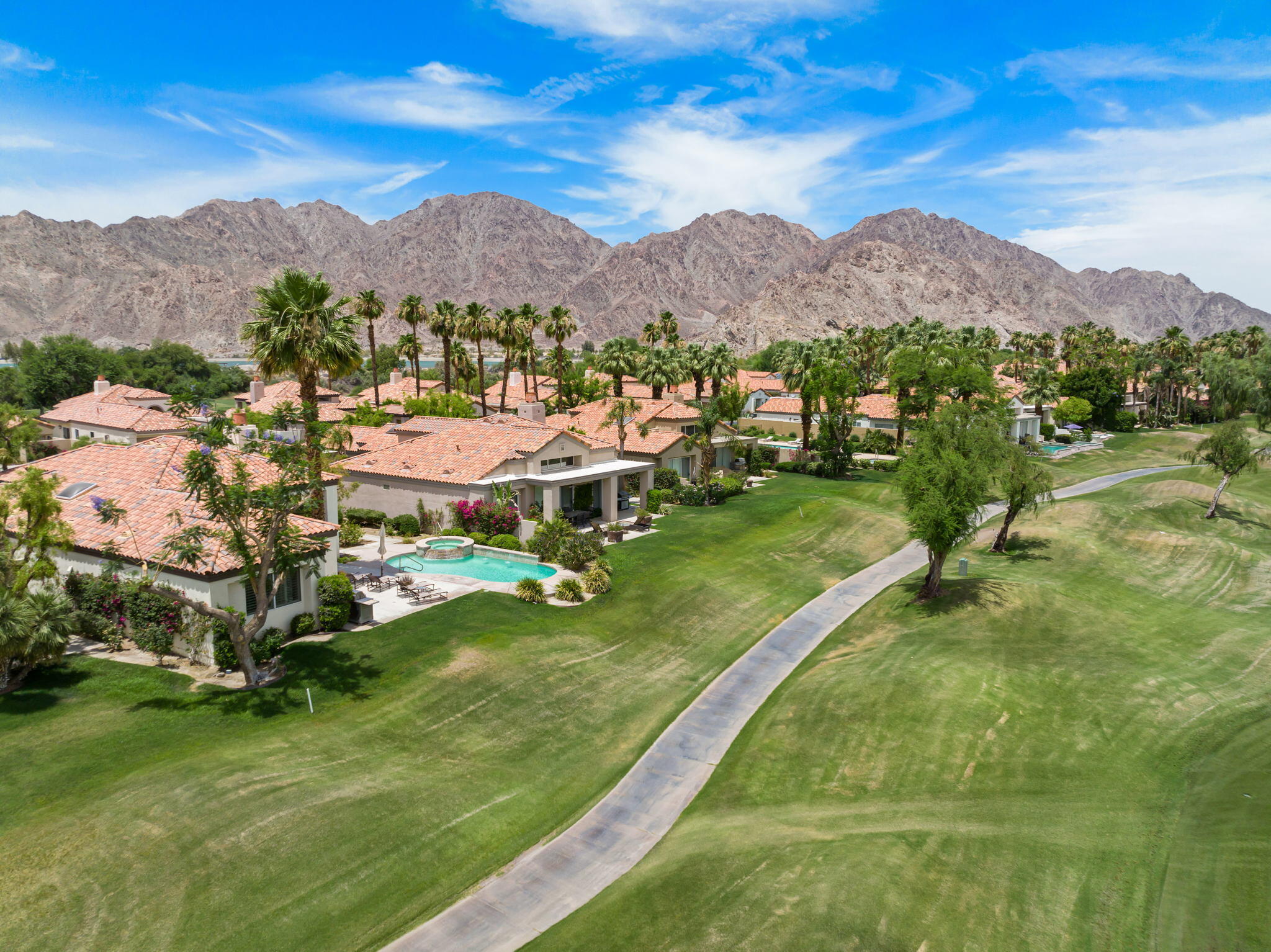 57084 Merion La Quinta, CA 92253 - Photo 15 of 56 a view of a lush green hillside and houses