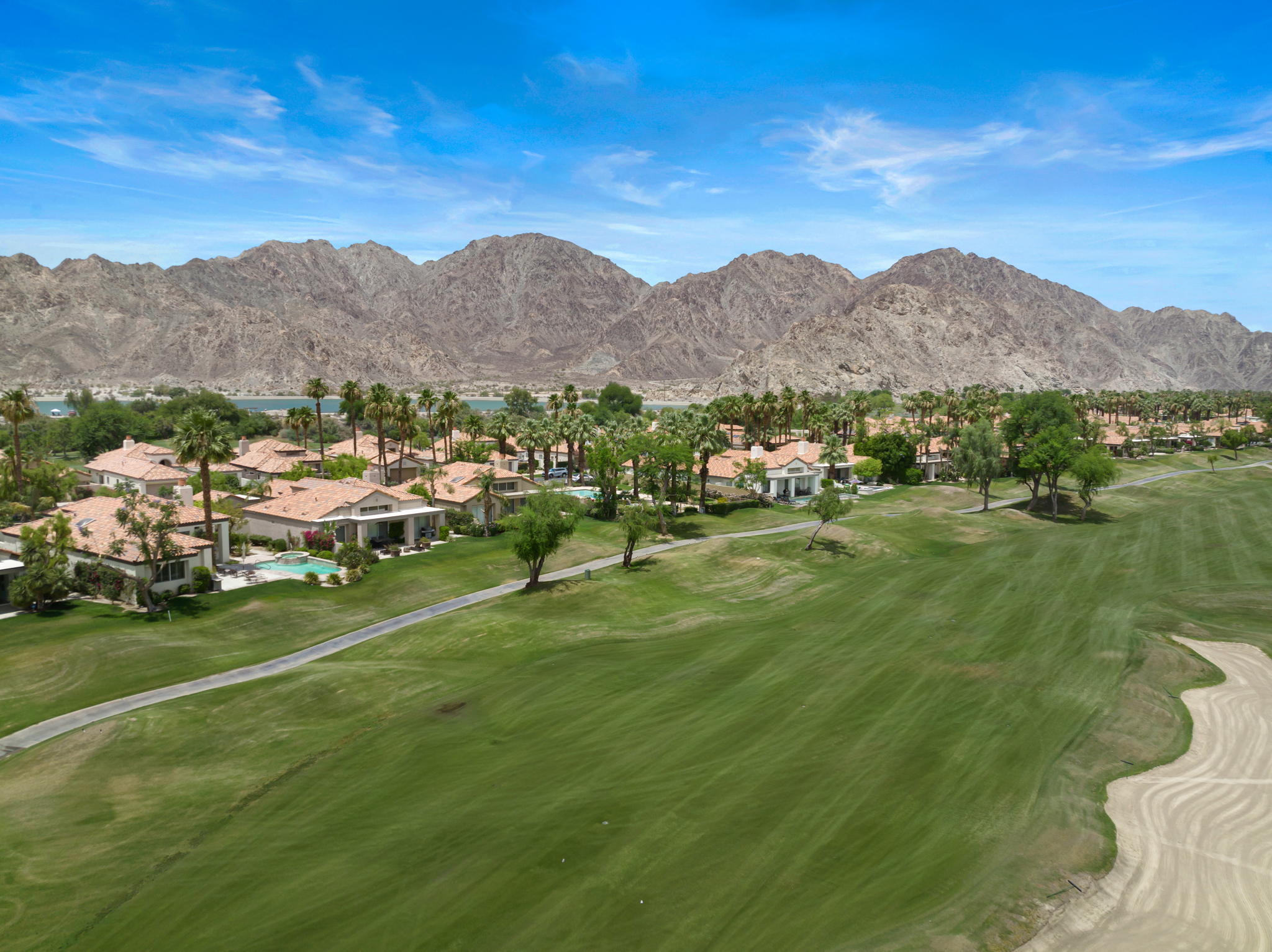 57084 Merion La Quinta, CA 92253 - Photo 16 of 56 a view of a lush green hillside and houses