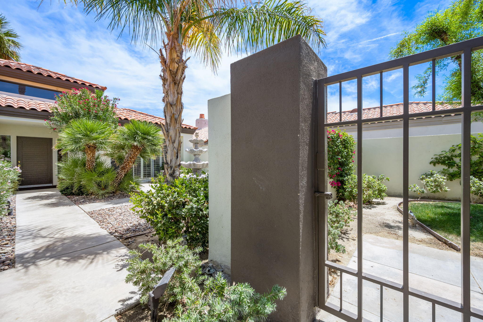 57084 Merion La Quinta, CA 92253 - Photo 19 of 56 a house view with a garden space