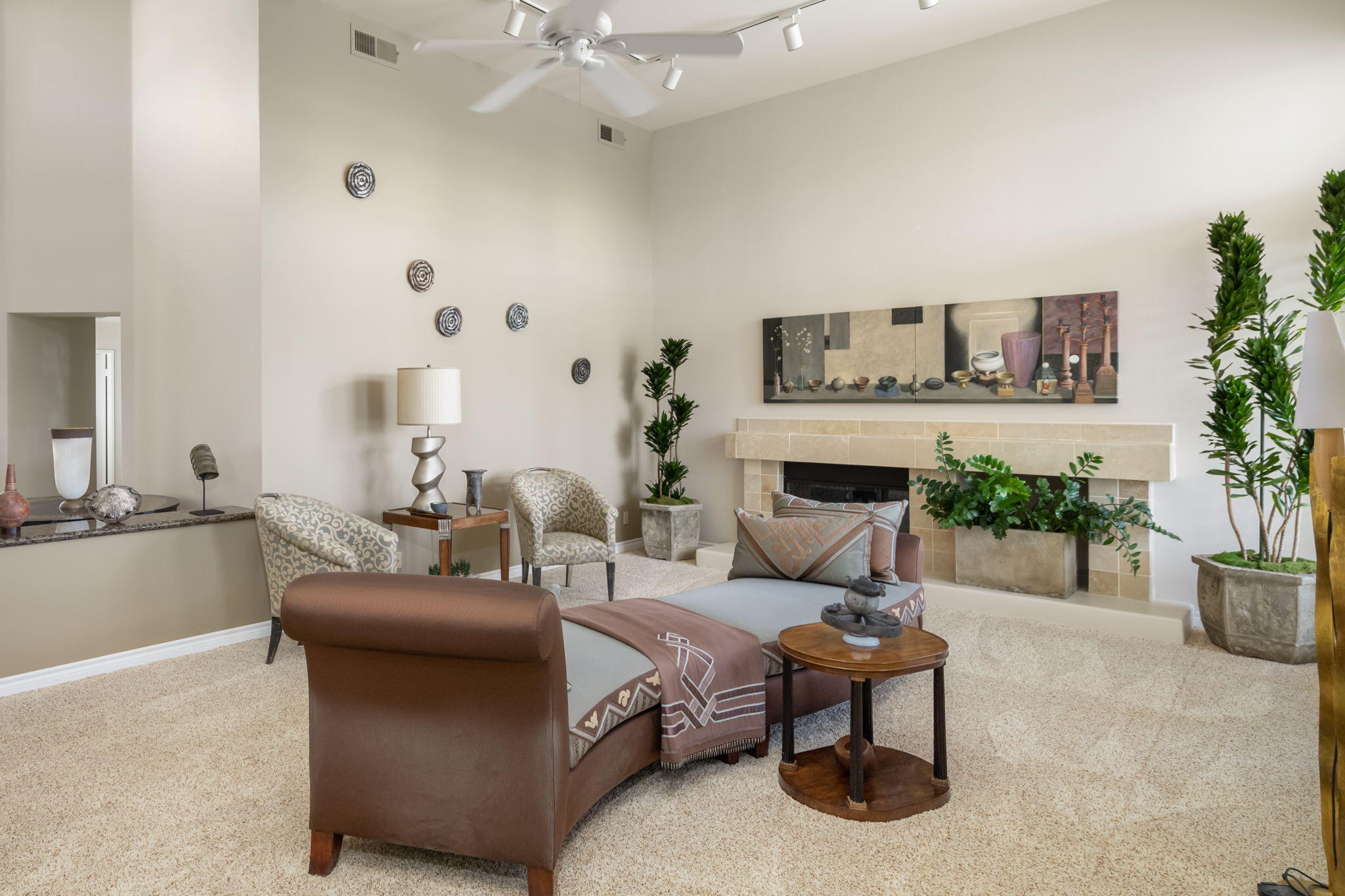 57084 Merion La Quinta, CA 92253 - Photo 26 of 56 a living room with furniture and flower plants