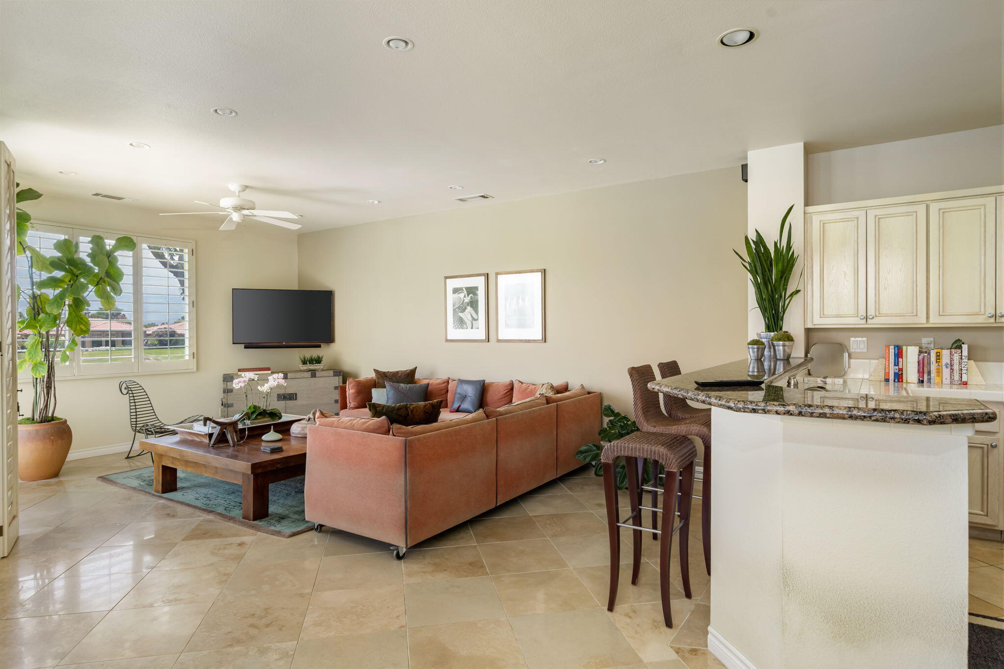 57084 Merion La Quinta, CA 92253 - Photo 31 of 56 a living room with furniture a flat screen tv and a window