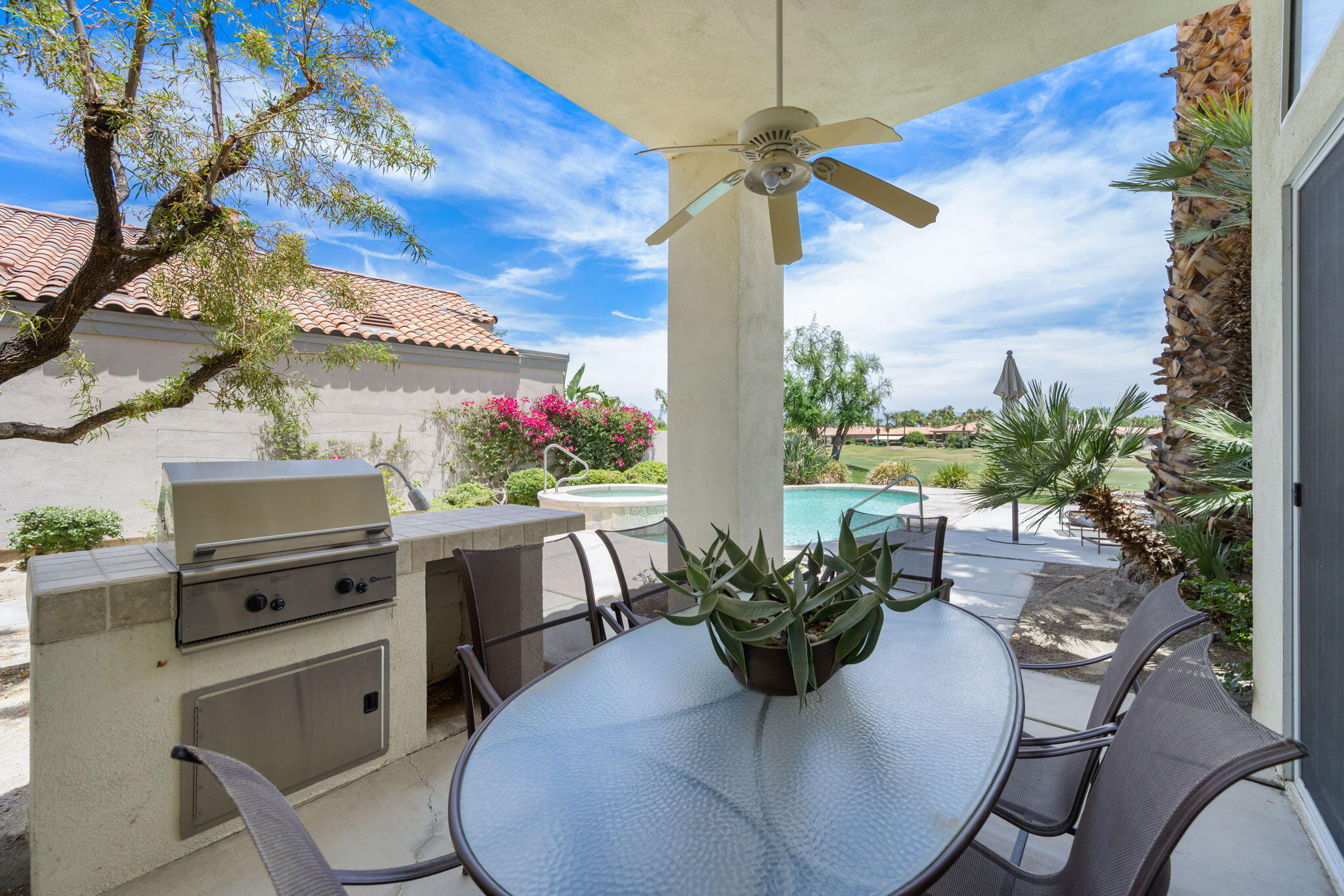 57084 Merion La Quinta, CA 92253 - Photo 42 of 56 a view of a dining room with furniture window and flowerpot