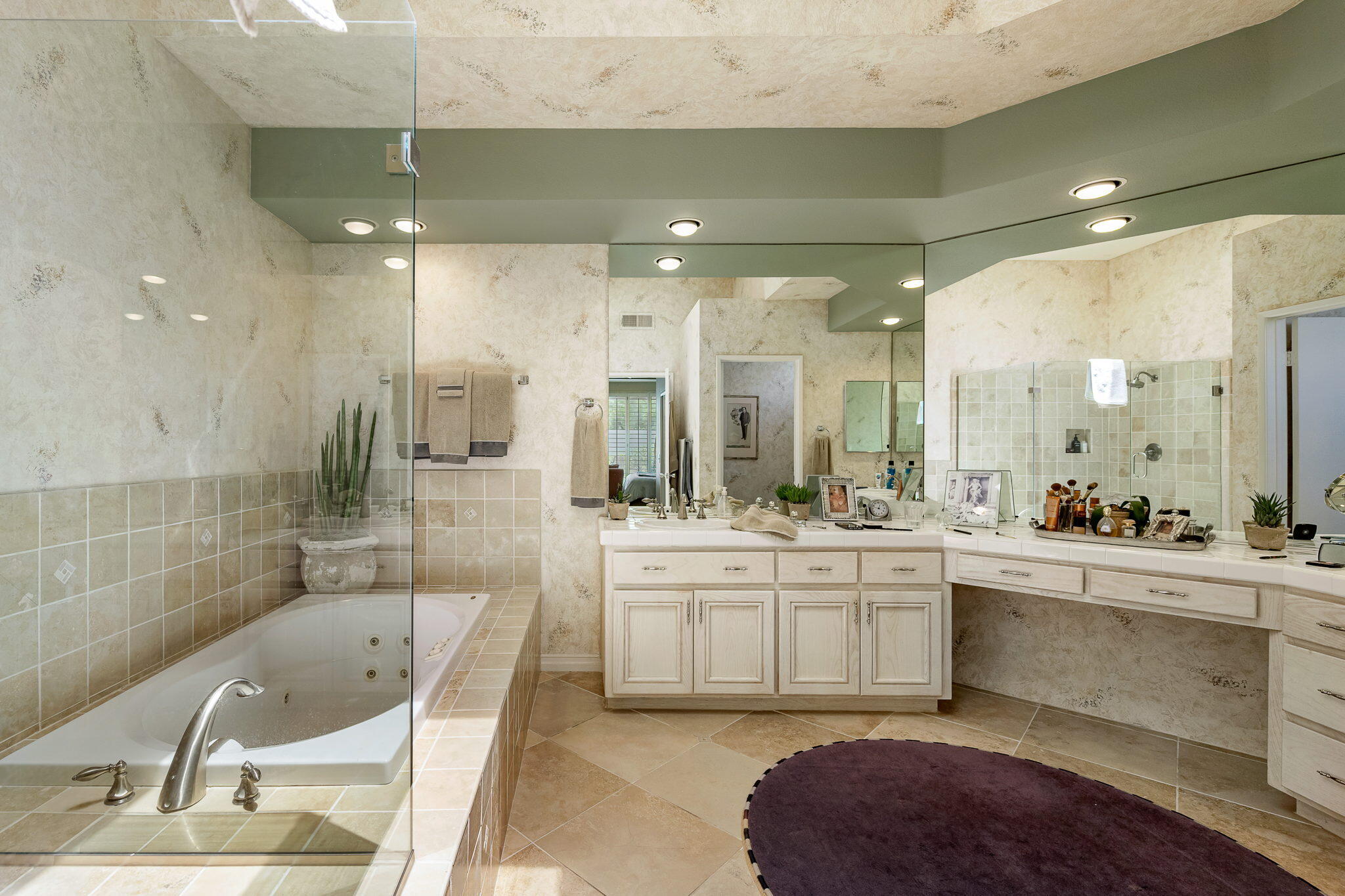 57084 Merion La Quinta, CA 92253 - Photo 48 of 56 a large bathroom with a large tub sink vanity and granite