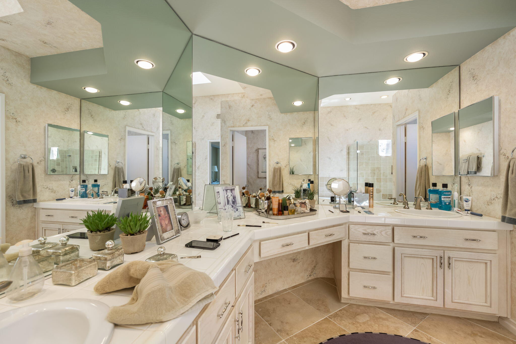 57084 Merion La Quinta, CA 92253 - Photo 49 of 56 a large white kitchen with a white cabinets and couch