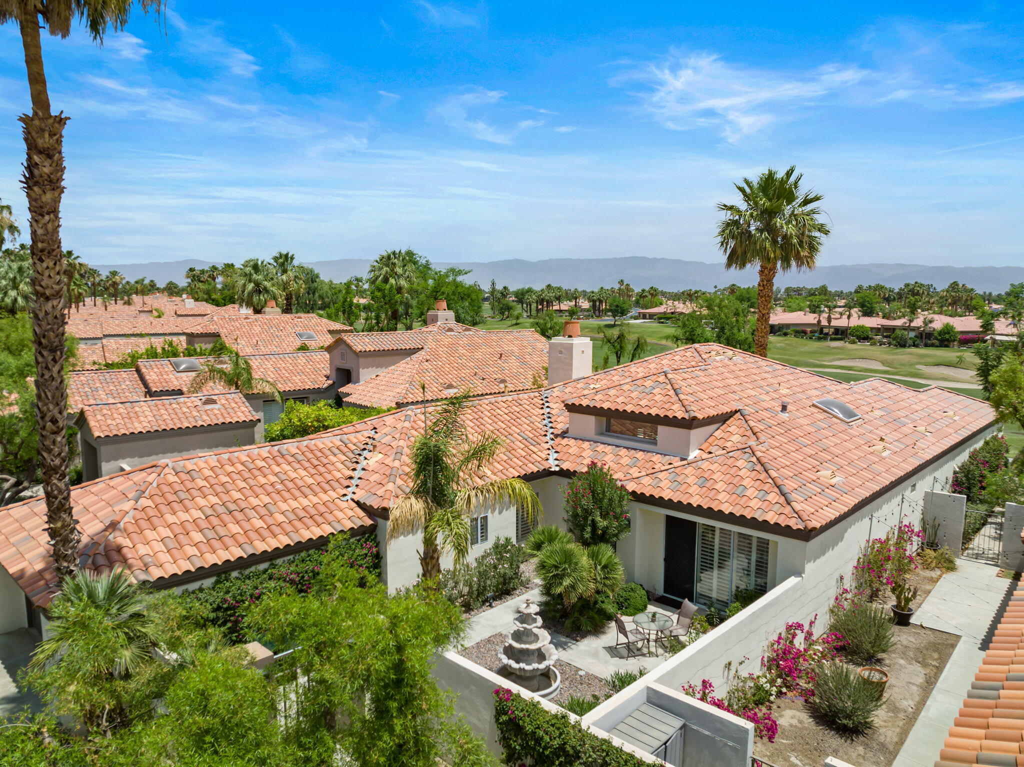 57084 Merion La Quinta, CA 92253 - Photo 7 of 56 an aerial view of multiple houses with yard