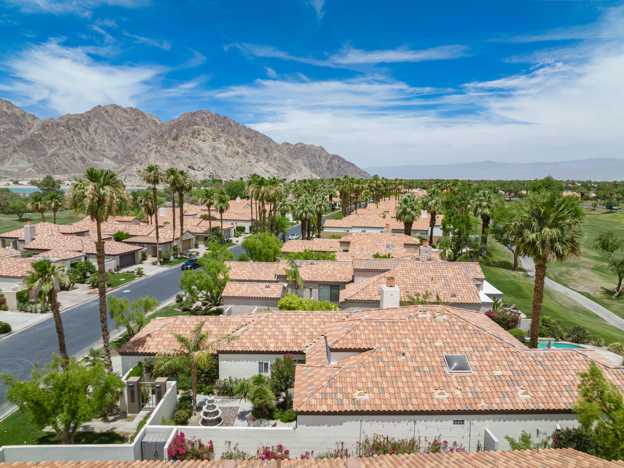 57084 Merion La Quinta, CA 92253 - Photo 8 of 56 a view of a terrace with a garden and mountain view