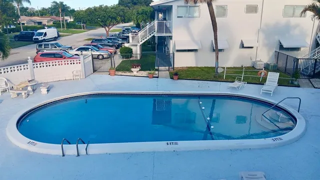 a view of a backyard of the house