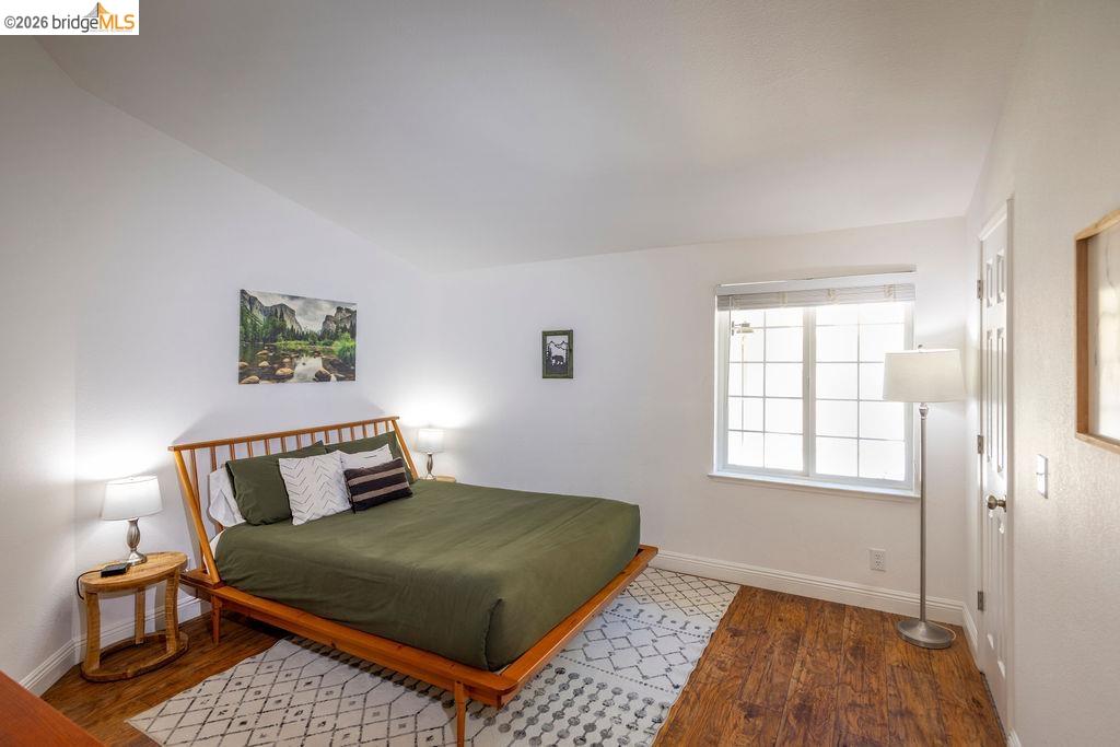 20828 Ferretti Road Groveland, CA 95321 - Photo 11 of 60 Bedroom with hardwood / wood-style flooring and baseboards