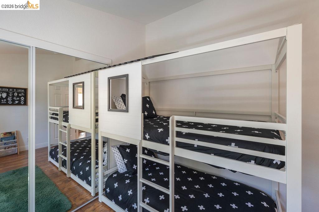 20828 Ferretti Road Groveland, CA 95321 - Photo 17 of 60 Bedroom with wood finished floors