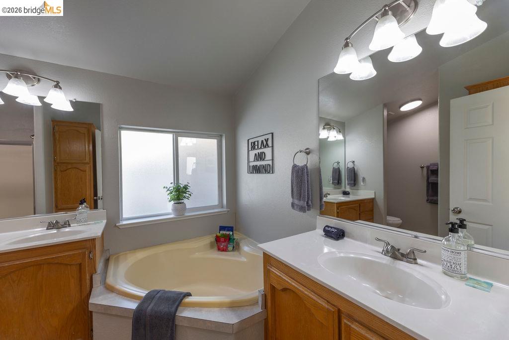 20828 Ferretti Road Groveland, CA 95321 - Photo 19 of 60 Full bath featuring two vanities and a bath