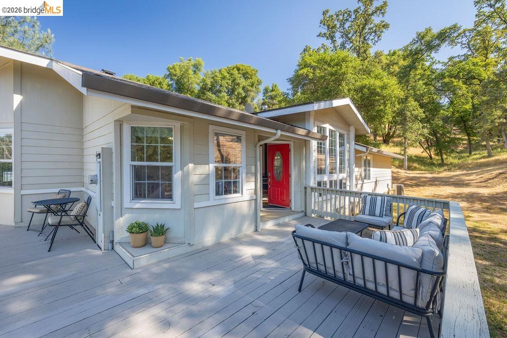 20828 Ferretti Road Groveland, CA 95321 - Photo 24 of 60 Wooden terrace with outdoor lounge area