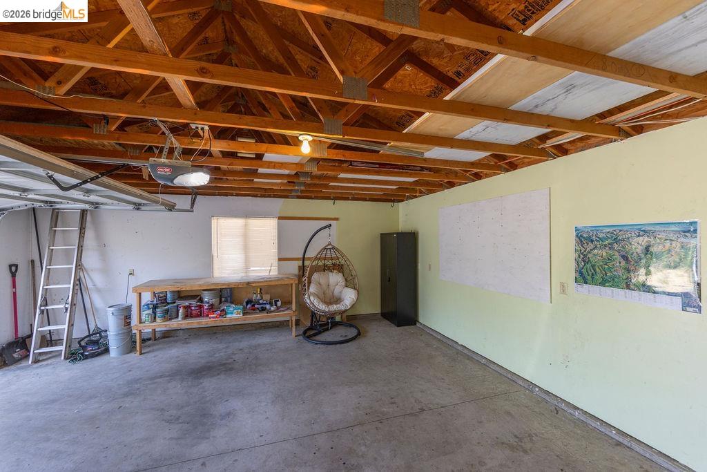 20828 Ferretti Road Groveland, CA 95321 - Photo 25 of 60 Garage featuring a garage door opener
