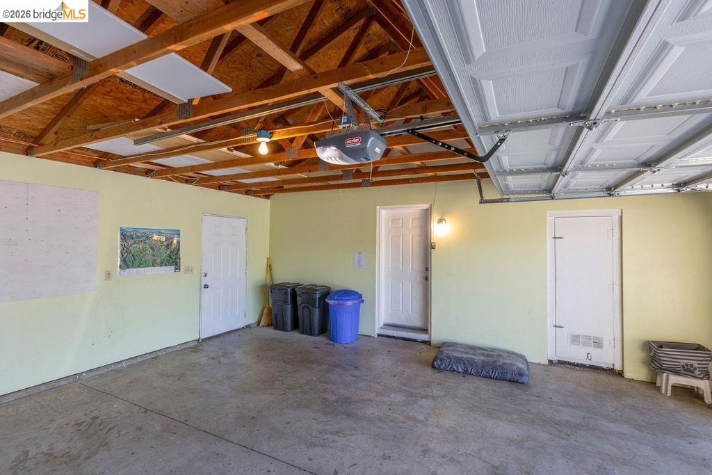 20828 Ferretti Road Groveland, CA 95321 - Photo 26 of 60 Garage featuring a garage door opener