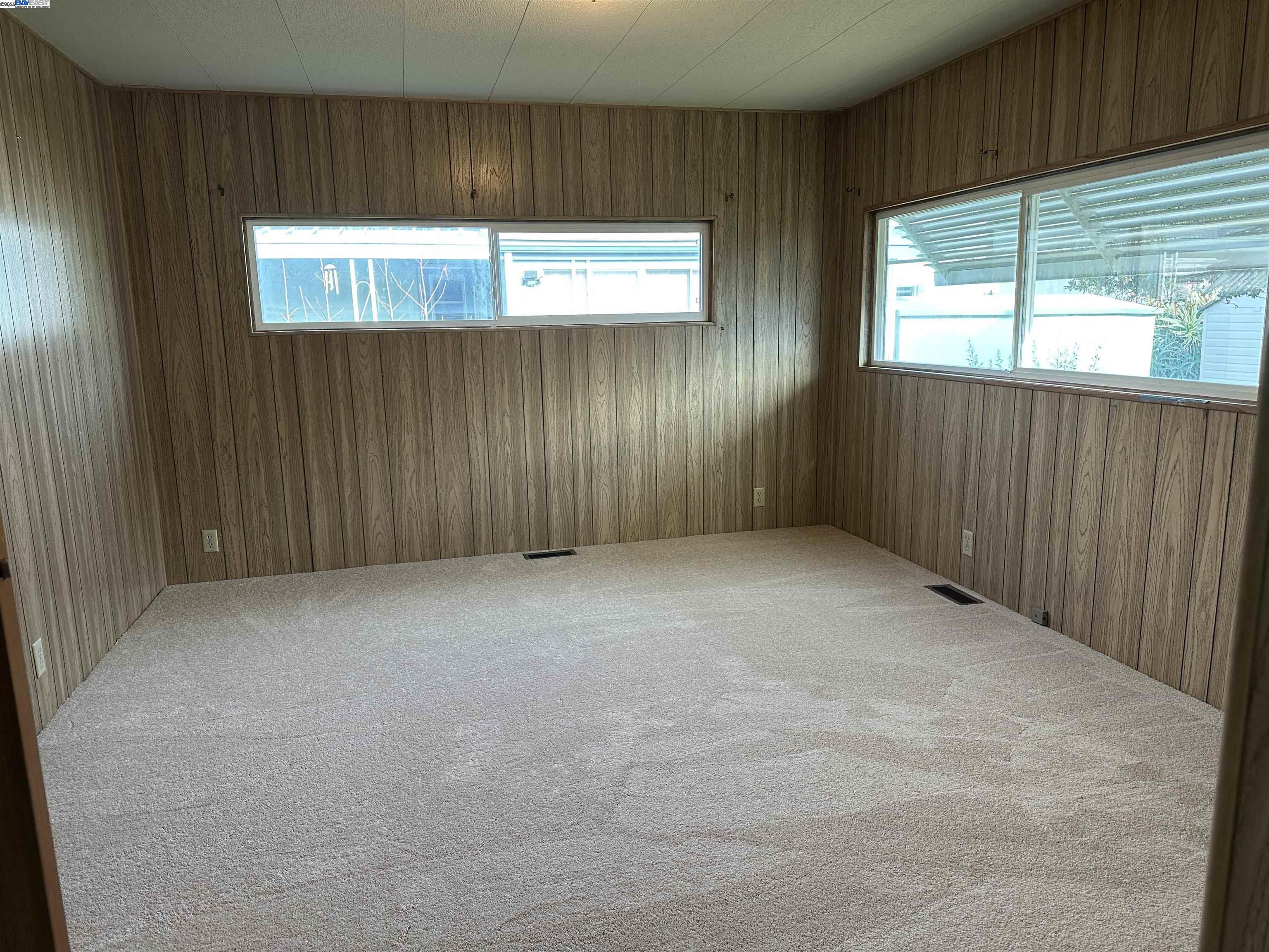 711 Old Canyon Road, Unit 77 Fremont, CA 94538 - Photo 28 of 39 an empty room with windows