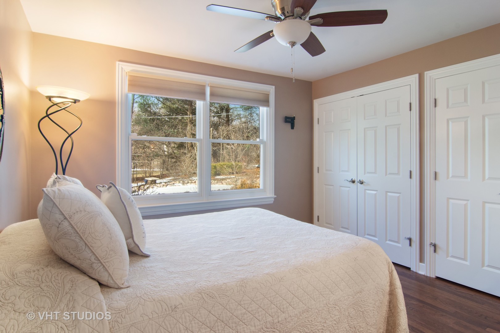 2140 West Baldwin Road Inverness, IL 60067 - Photo 14 of 32 a bedroom with a bed and a window