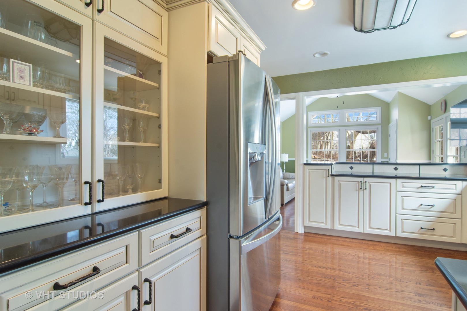 2140 West Baldwin Road Inverness, IL 60067 - Photo 6 of 32 a kitchen with stainless steel appliances granite countertop a refrigerator and a sink