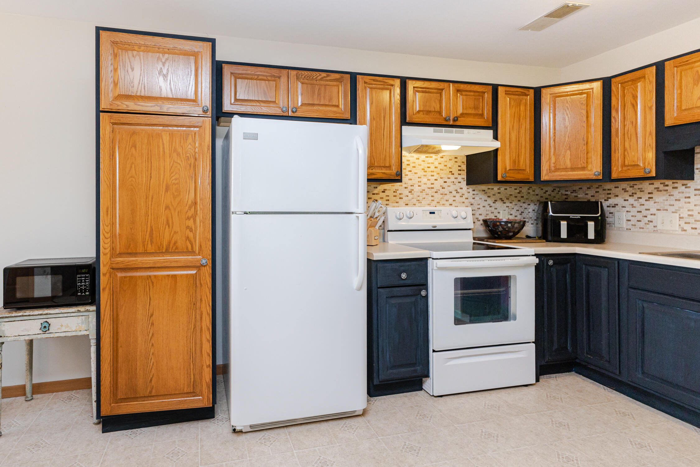 984 Spring Court Newburg, WI 53095 - Photo 4 of 21 Additional pantry for storage!