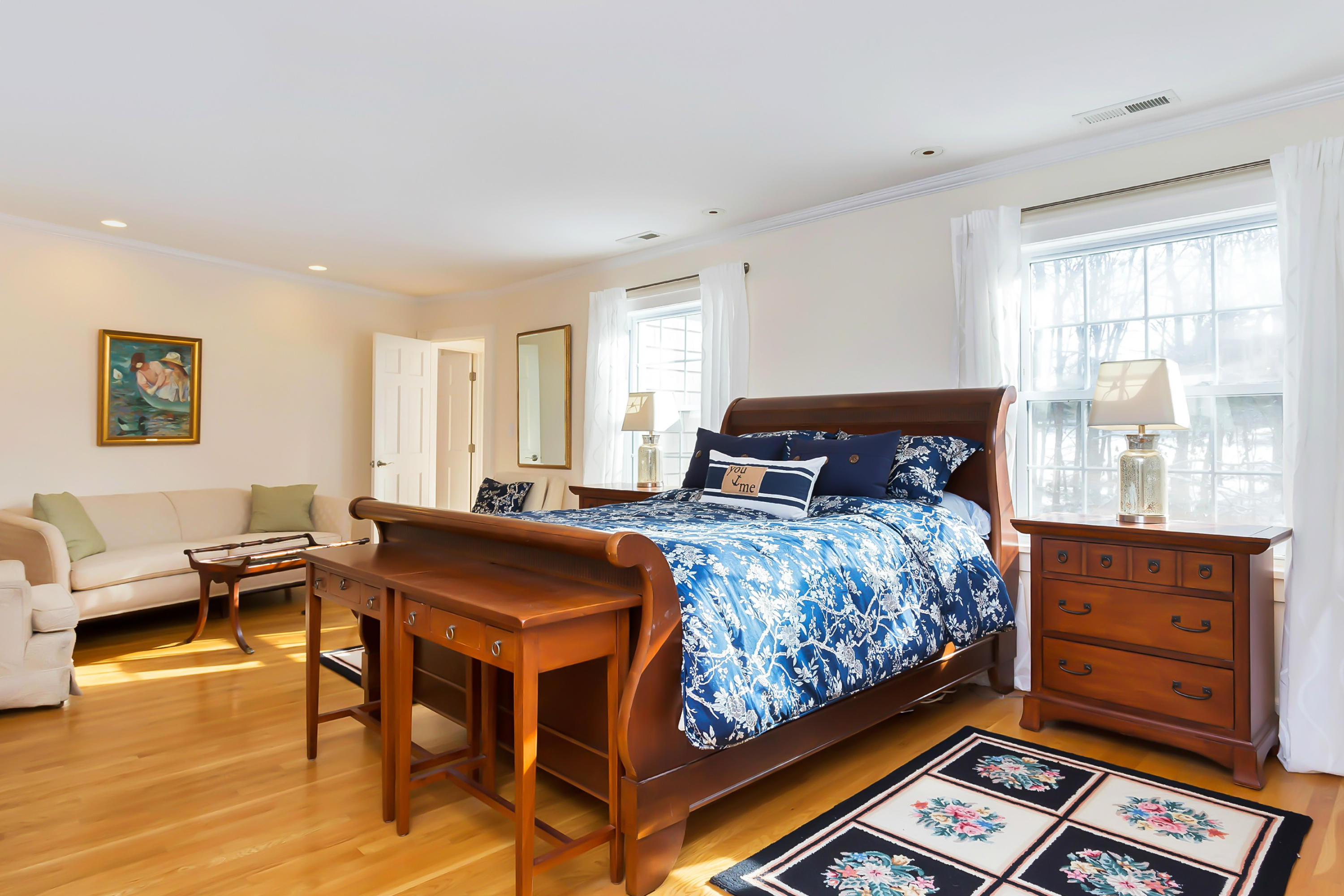 279 Silvermine Road New Canaan, CT 06840 - Photo 14 of 24 a bedroom with a bed and wooden floor