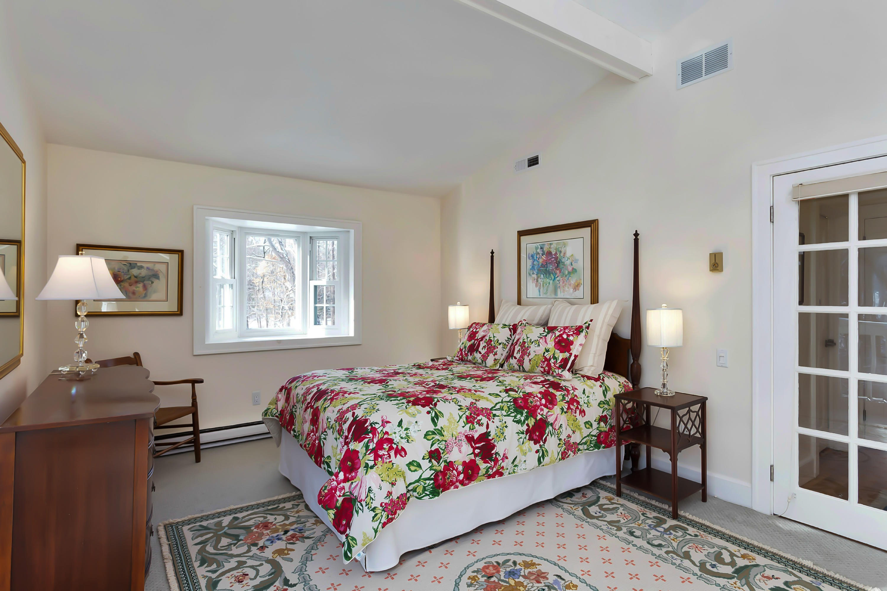 279 Silvermine Road New Canaan, CT 06840 - Photo 17 of 24 a bedroom with bed and a window