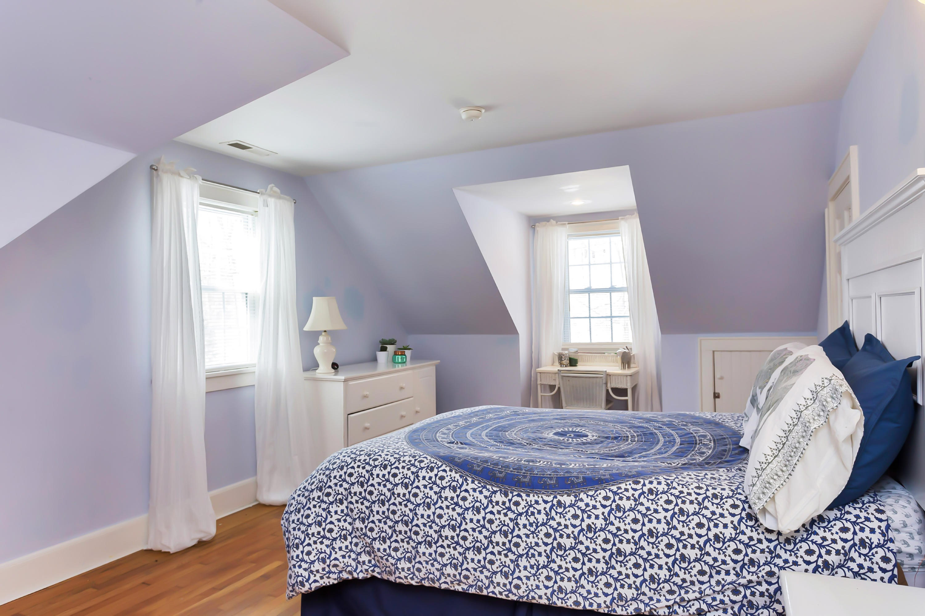 279 Silvermine Road New Canaan, CT 06840 - Photo 18 of 24 a bedroom with a bed dresser and a window