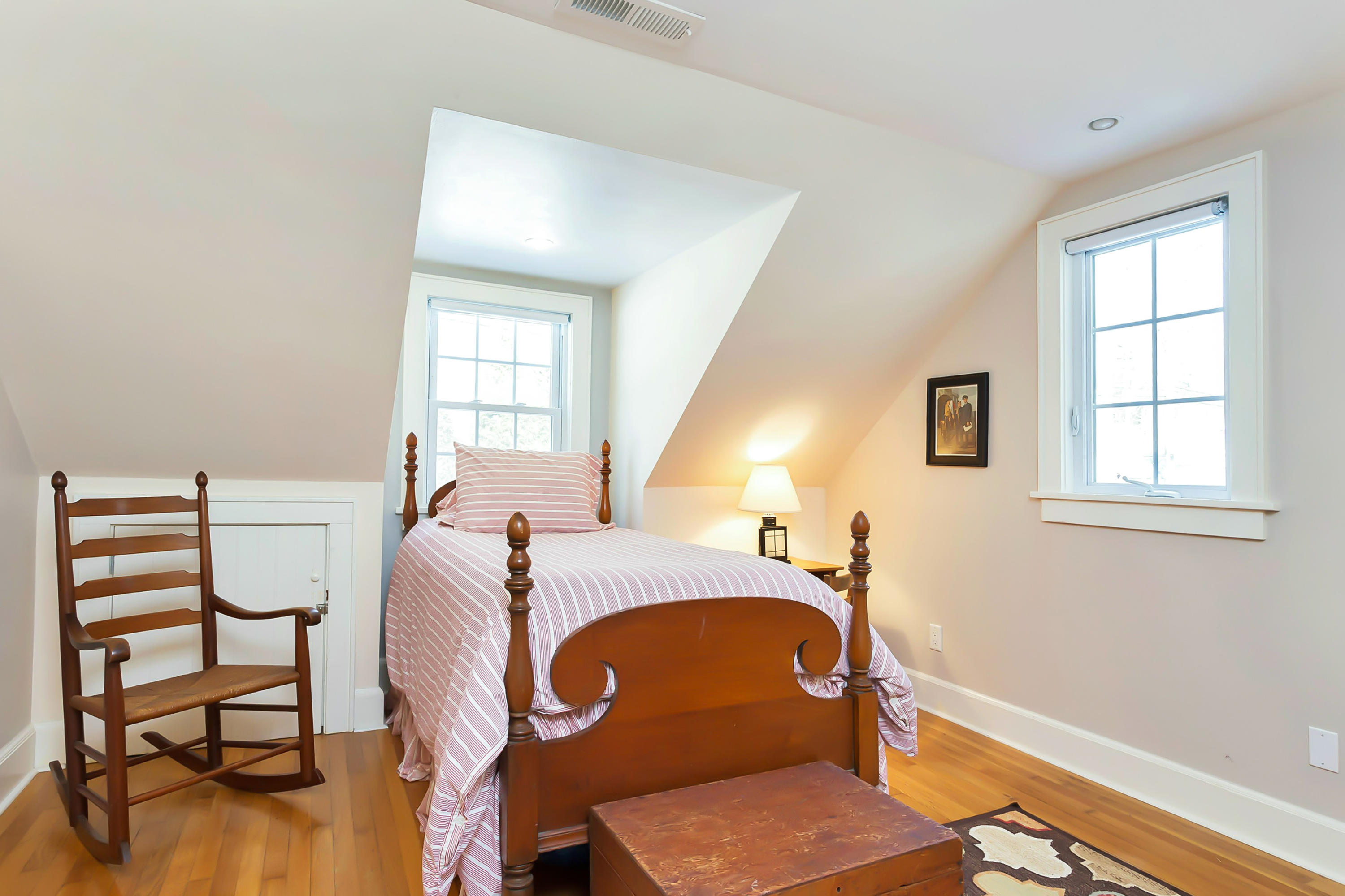 279 Silvermine Road New Canaan, CT 06840 - Photo 19 of 24 a bedroom with a bed a window and dresser