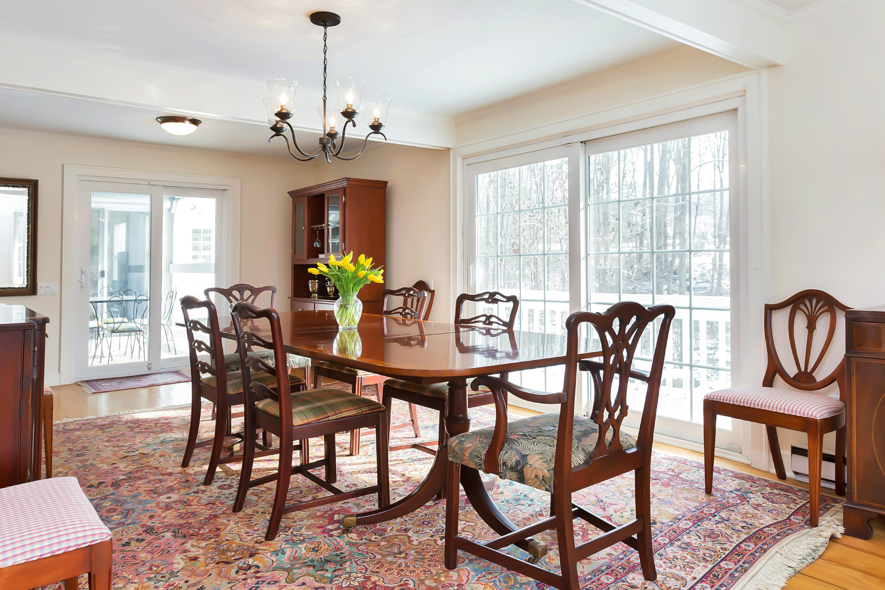 279 Silvermine Road New Canaan, CT 06840 - Photo 6 of 24 a view of a dining room with furniture window and wooden floor