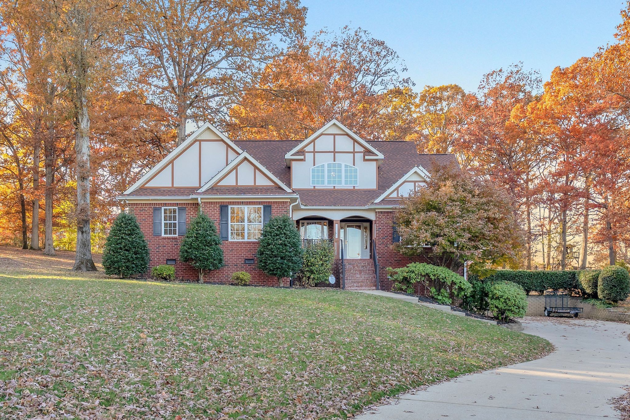 7315 McCormick Drive Fairview, TN 37062 - Photo 1 of 56 a front view of a house with a yard and trees