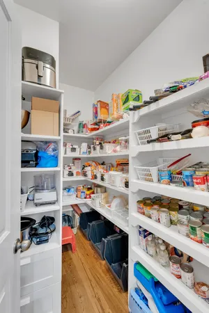 a bedroom with a bed and a closet