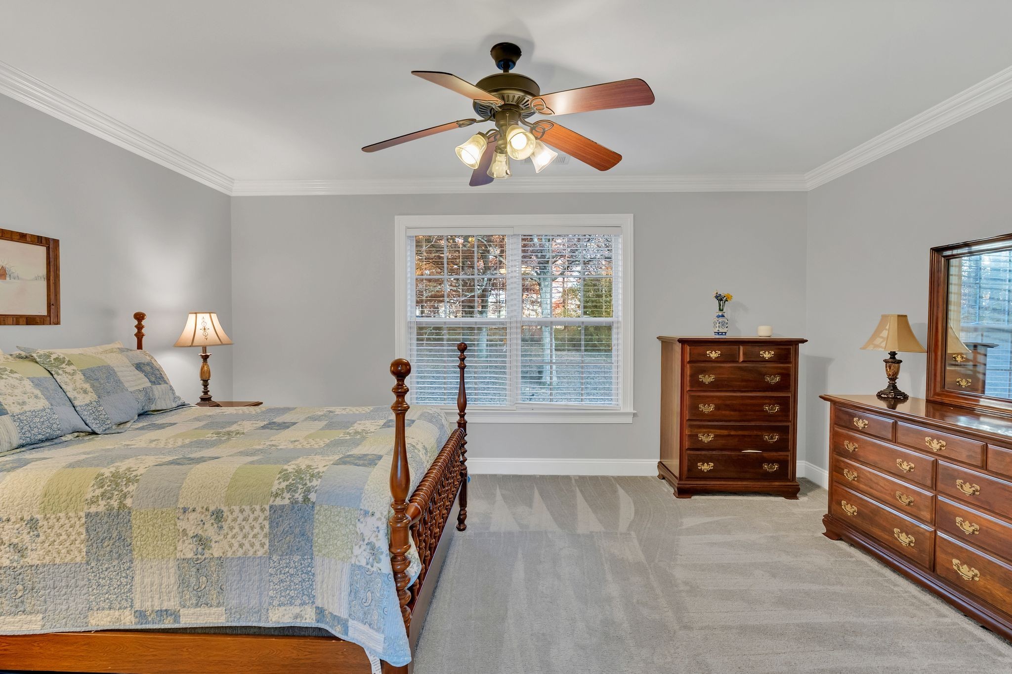 7315 McCormick Drive Fairview, TN 37062 - Photo 36 of 56 a bedroom with a bed and a dresser