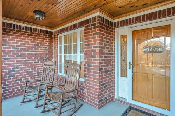 a view of a balcony with chair