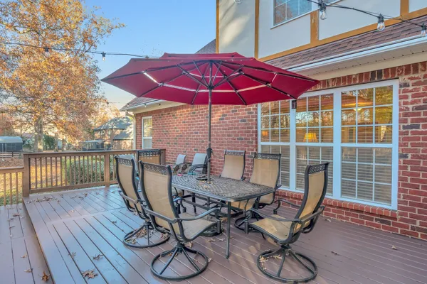 a backyard of a house with lots of trees