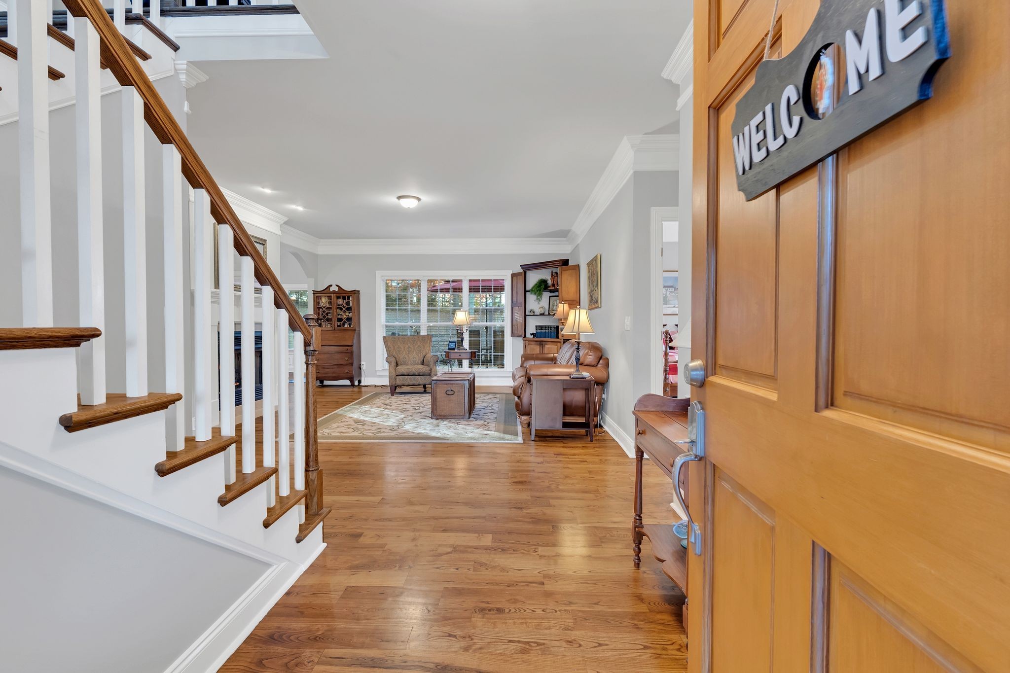 7315 McCormick Drive Fairview, TN 37062 - Photo 6 of 56 a living room with furniture and stairs